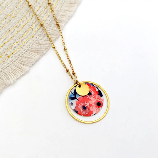 Collier pendentif fleurs rouges et rayures bleues pour femme