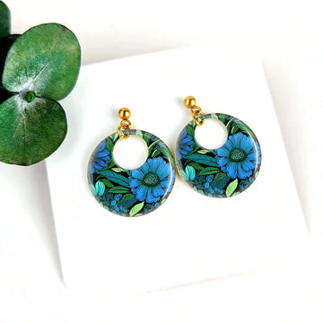 Boucles d'oreilles laiton doré et résine pour femme - Fleur bleue