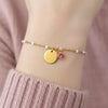 Bracelet personnalisé chaîne en émail blanc et médaille gravée