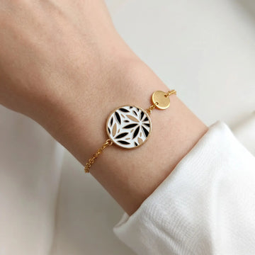 Bracelet fleurs en émail or, noir et blanc pour femme